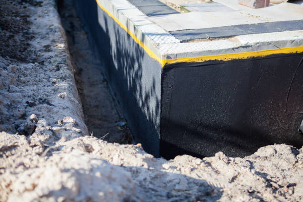Professional Waterproofing technician working in Georgetown, TN